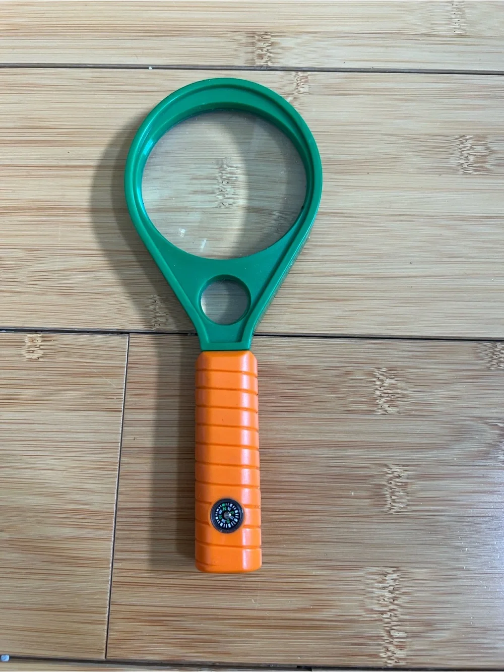 Kids Green Magnifier with Orange Handle and Built-In Compass